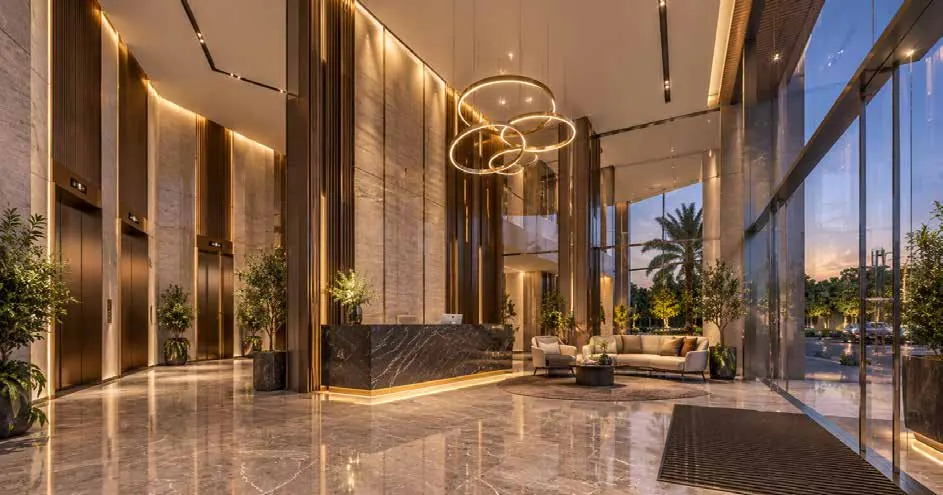 Double-height entrance lobby with marble reception